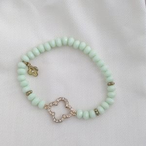 Fleur de lis stretch bracelet.
